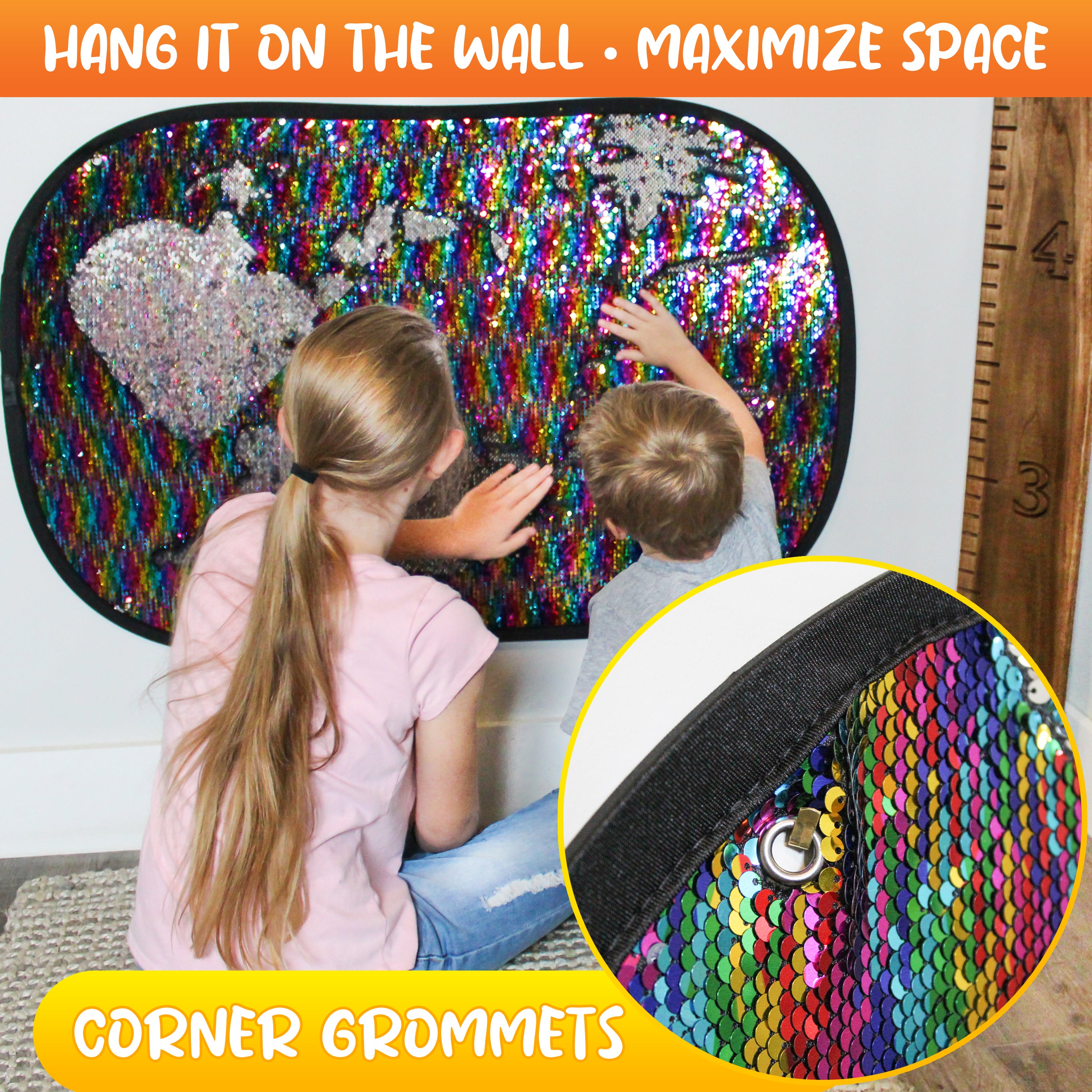 Children using the Giant Reversible Rainbow Sequins Toy mounted on a wall with corner grommets