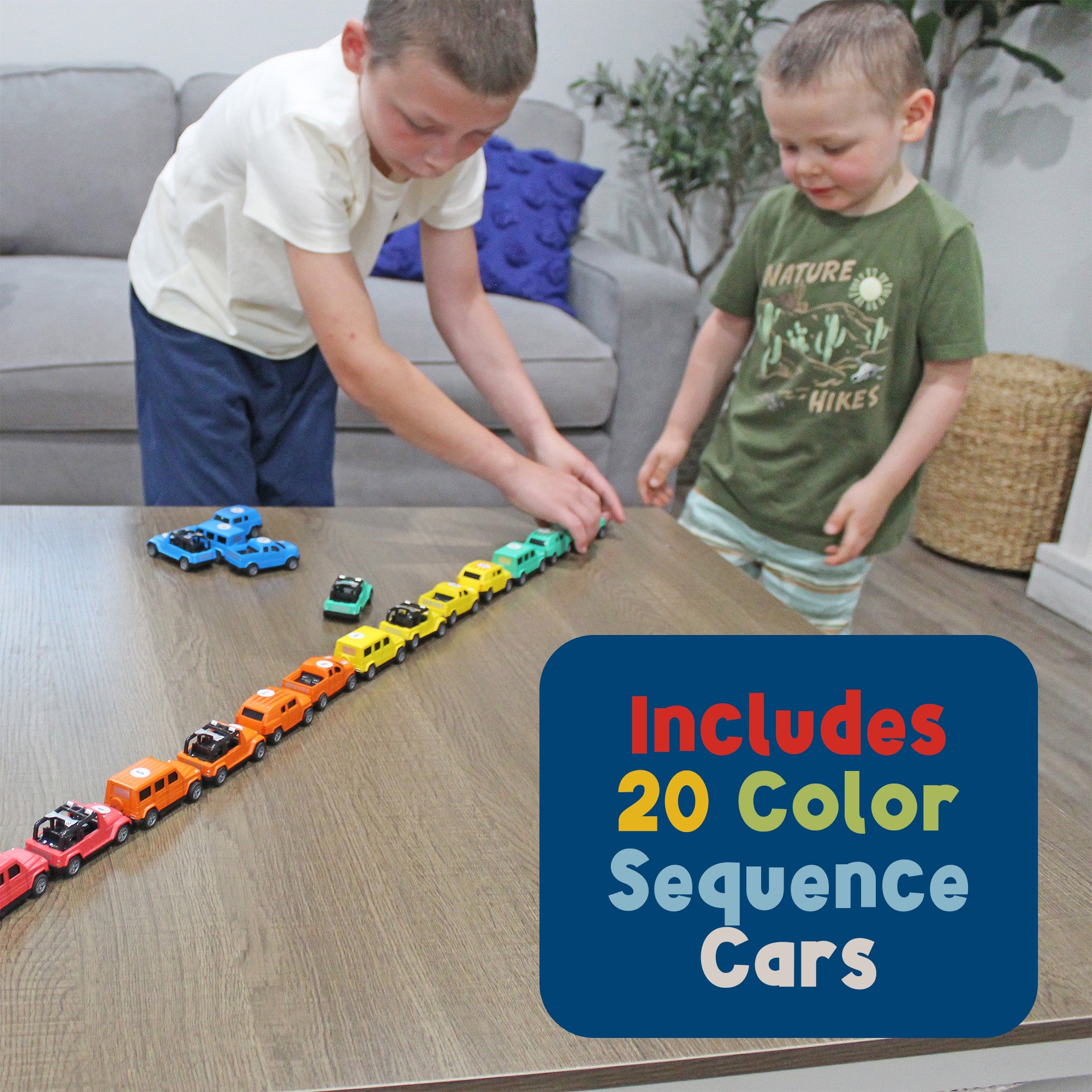 Two children lining up 20 colorful MEAVIA pull-back cars in a long sequence on a table