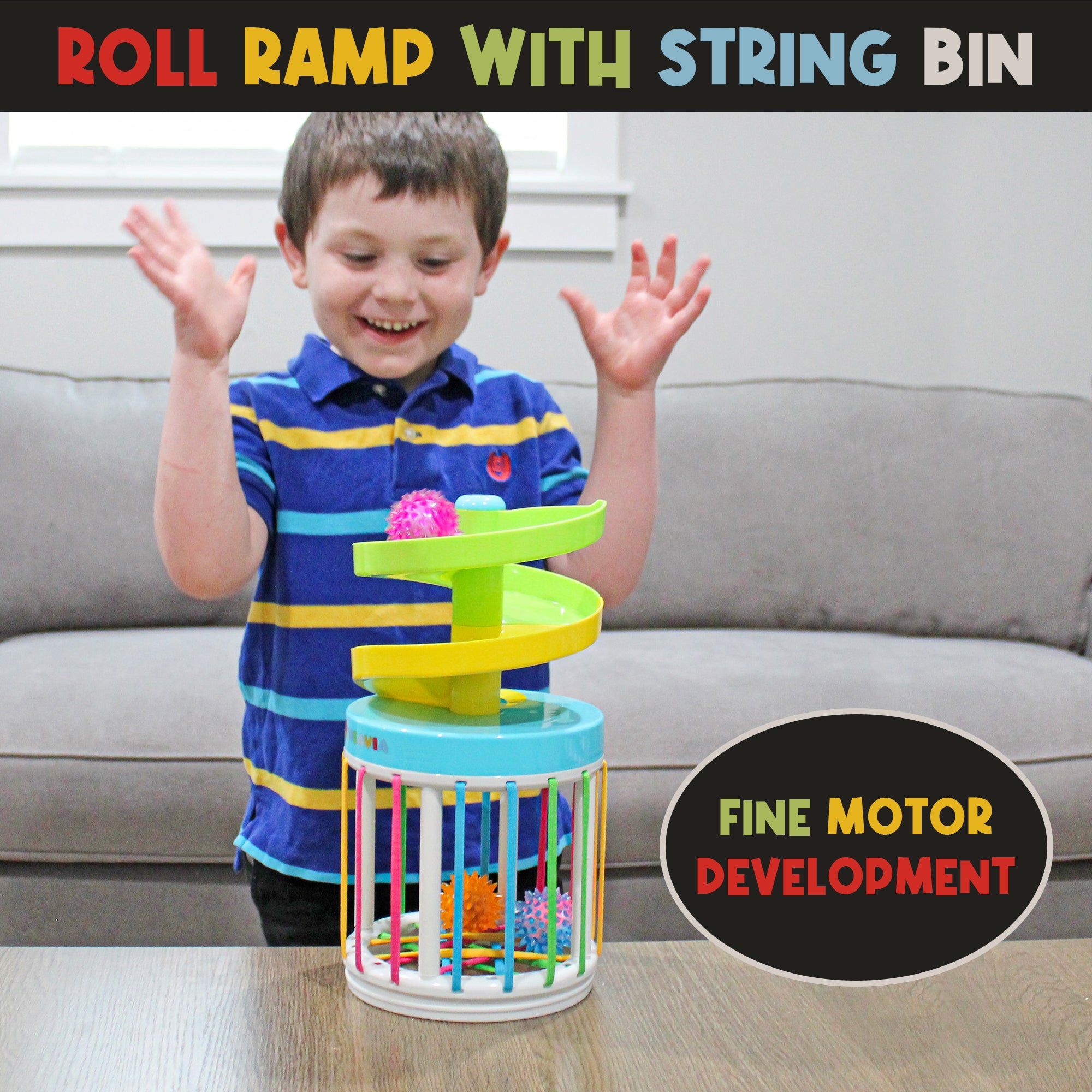 Smiling child playing with the MEAVIA Roll & Drop 3-in-1 Sensory Toy using the spiral ramp and string bin