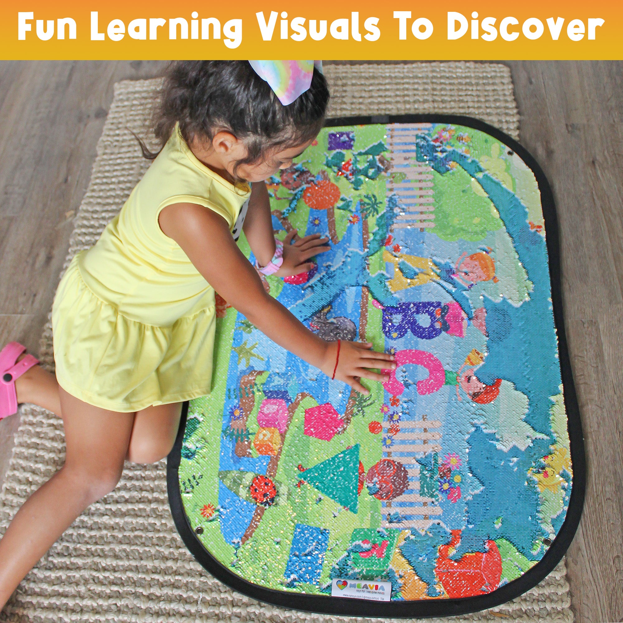 Child exploring the reversible sequins and learning visuals on the Giant Sequins Learning Discovery Toy